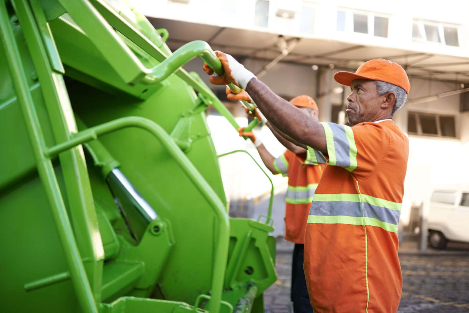 Garbage truck workers in Mississauga
