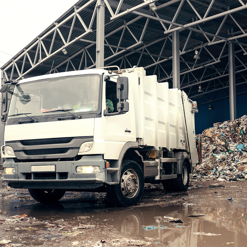 Waste truck unloading garbage