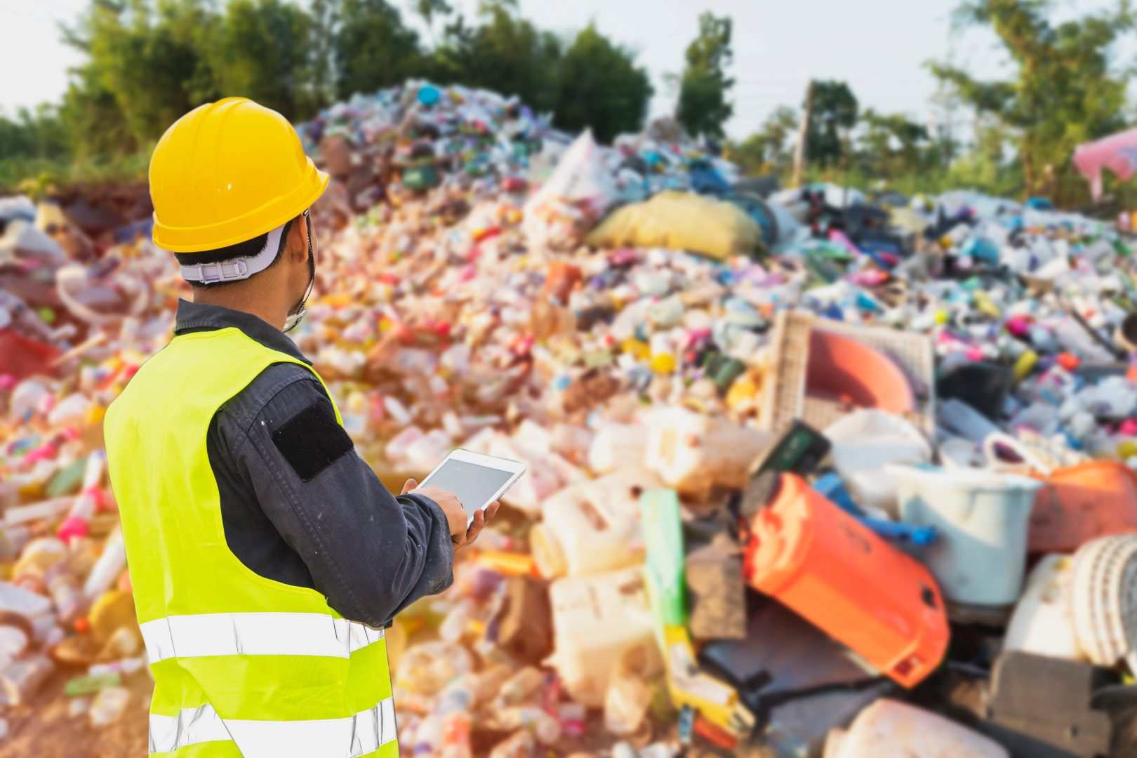 Worker sorting recyclable waste in Markham